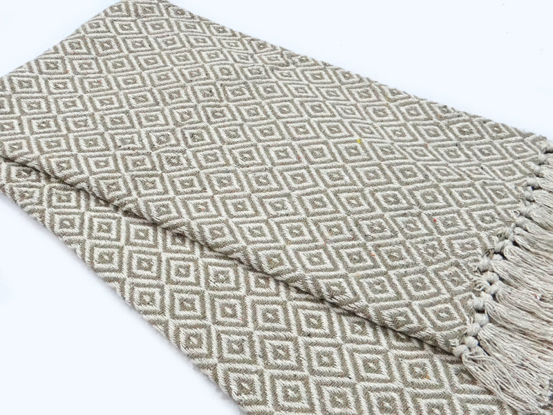 Brown throw with rhombus pattern